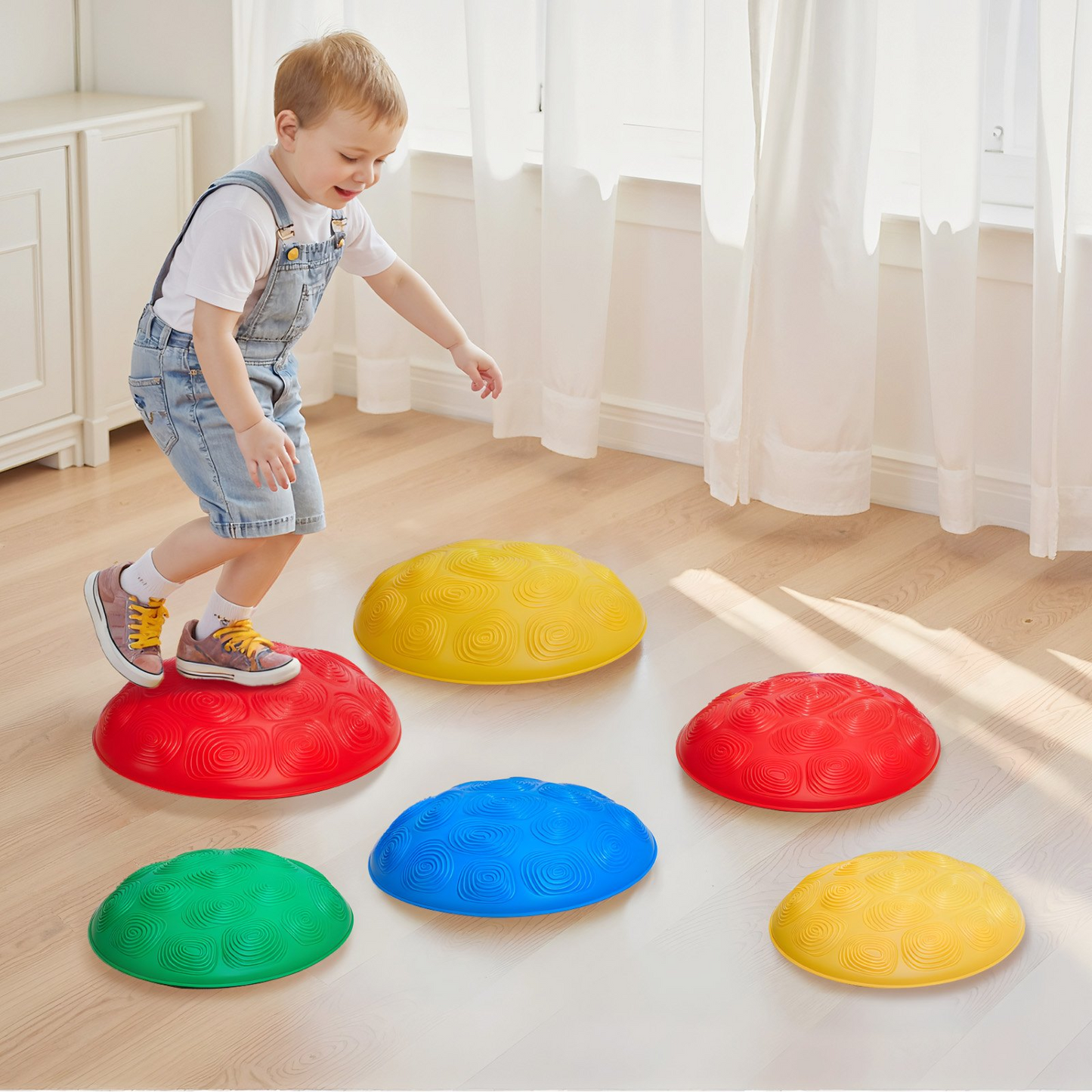 Child playing with colorful stepping stones on a wooden floor.