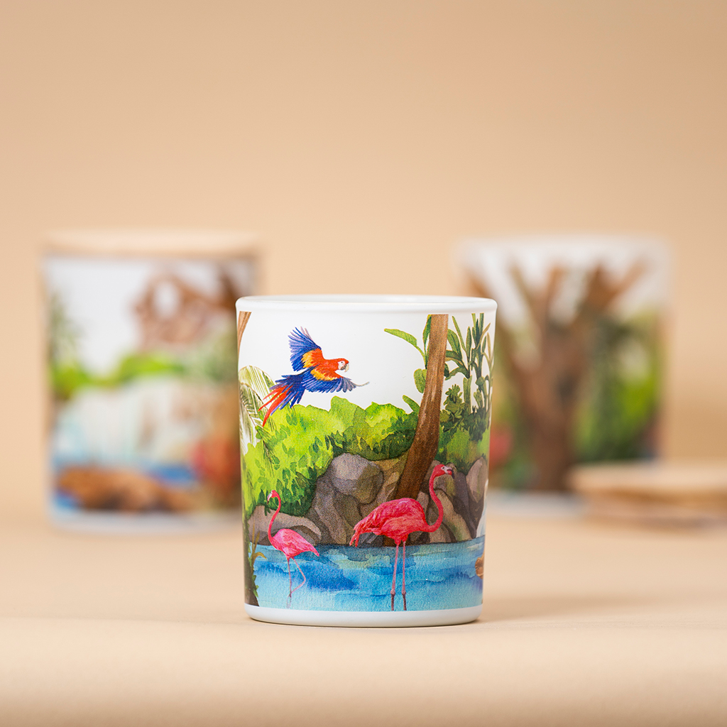 Ceramic candle holder with a colorful parrot and flamingo design on a beige background