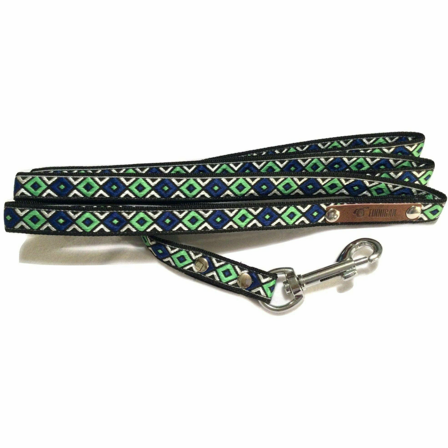 Dog leash with green and blue pattern on a white background