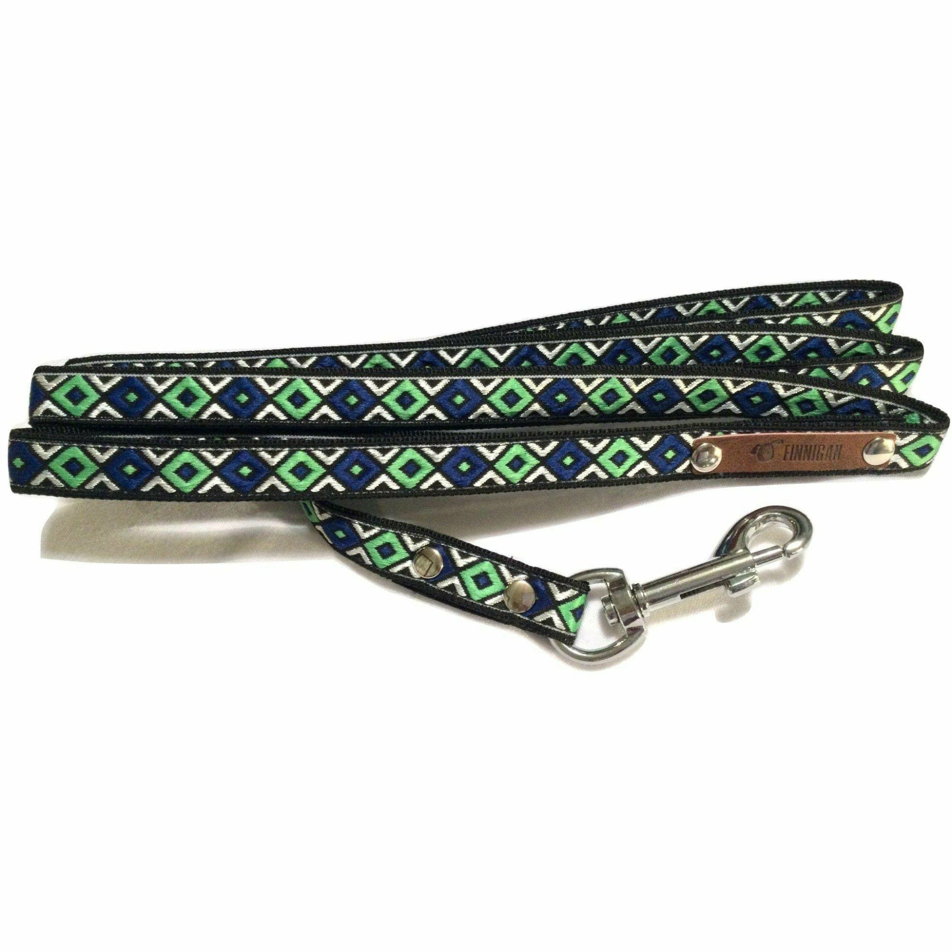 Dog leash with green and blue pattern on a white background