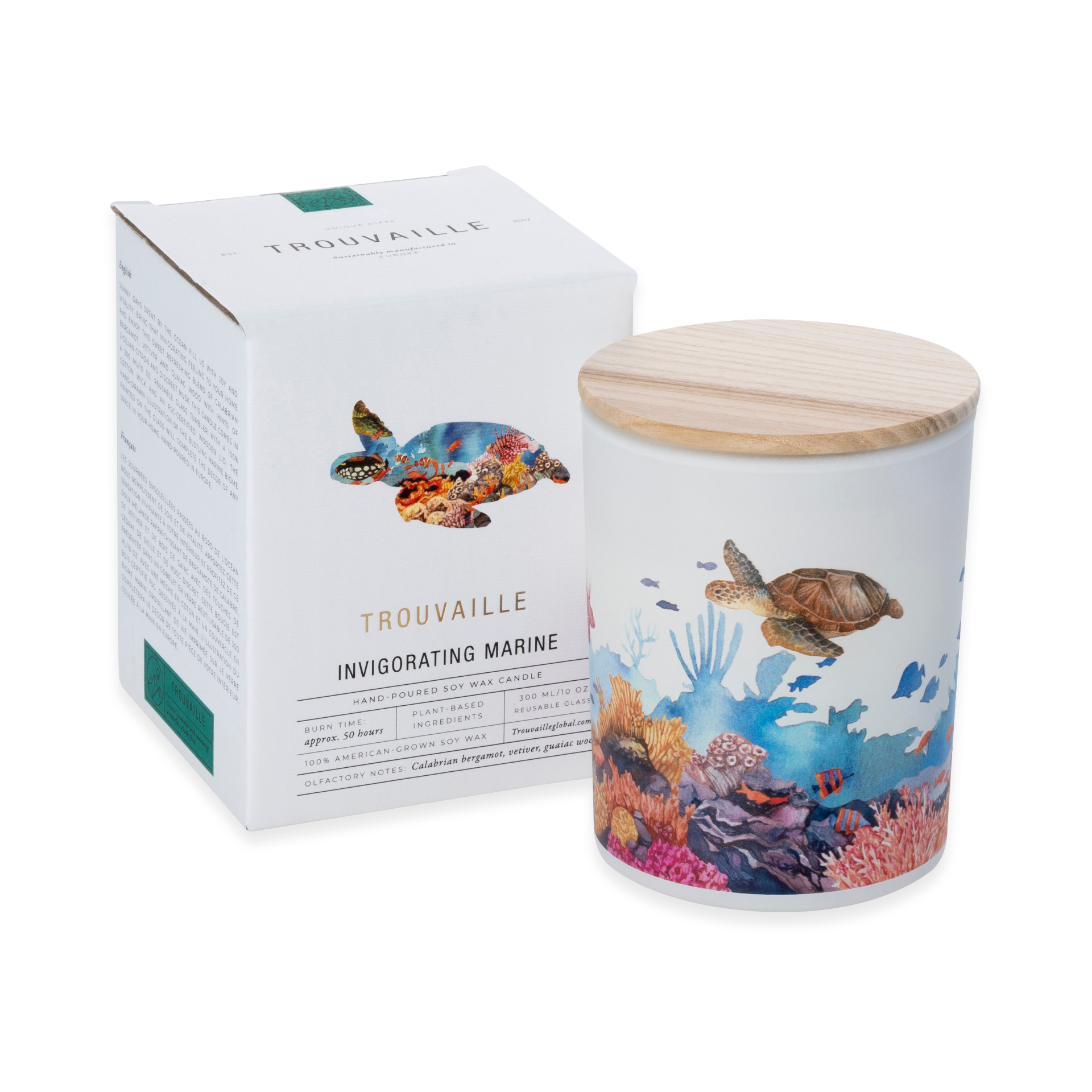 Scented candle with ocean-themed design and packaging on a white background