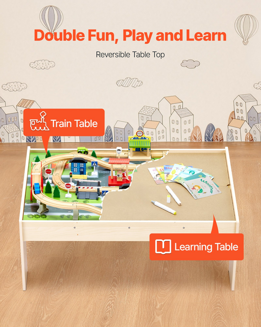 Double-sided table top with train set and educational materials on a wooden floor.